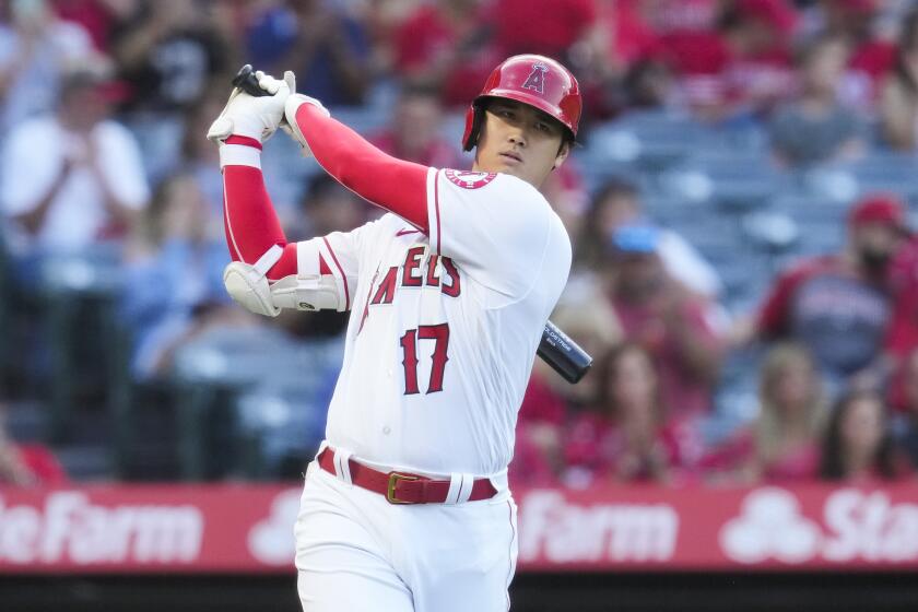 Los Angeles Angels designated hitter Shohei Ohtani (17) warms up before stepping up to bat.