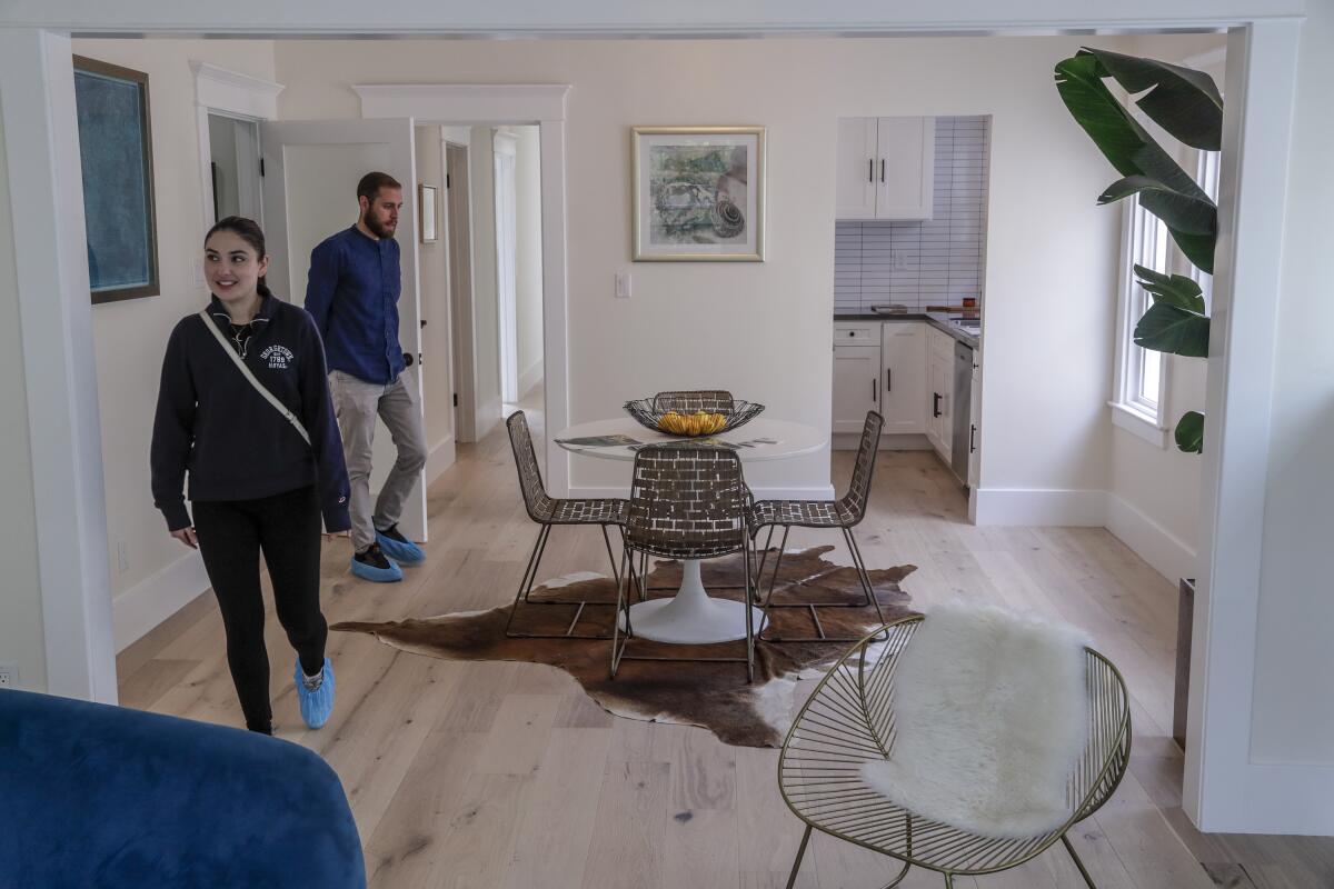 Potential buyers look through an open house last month in Los Angeles.