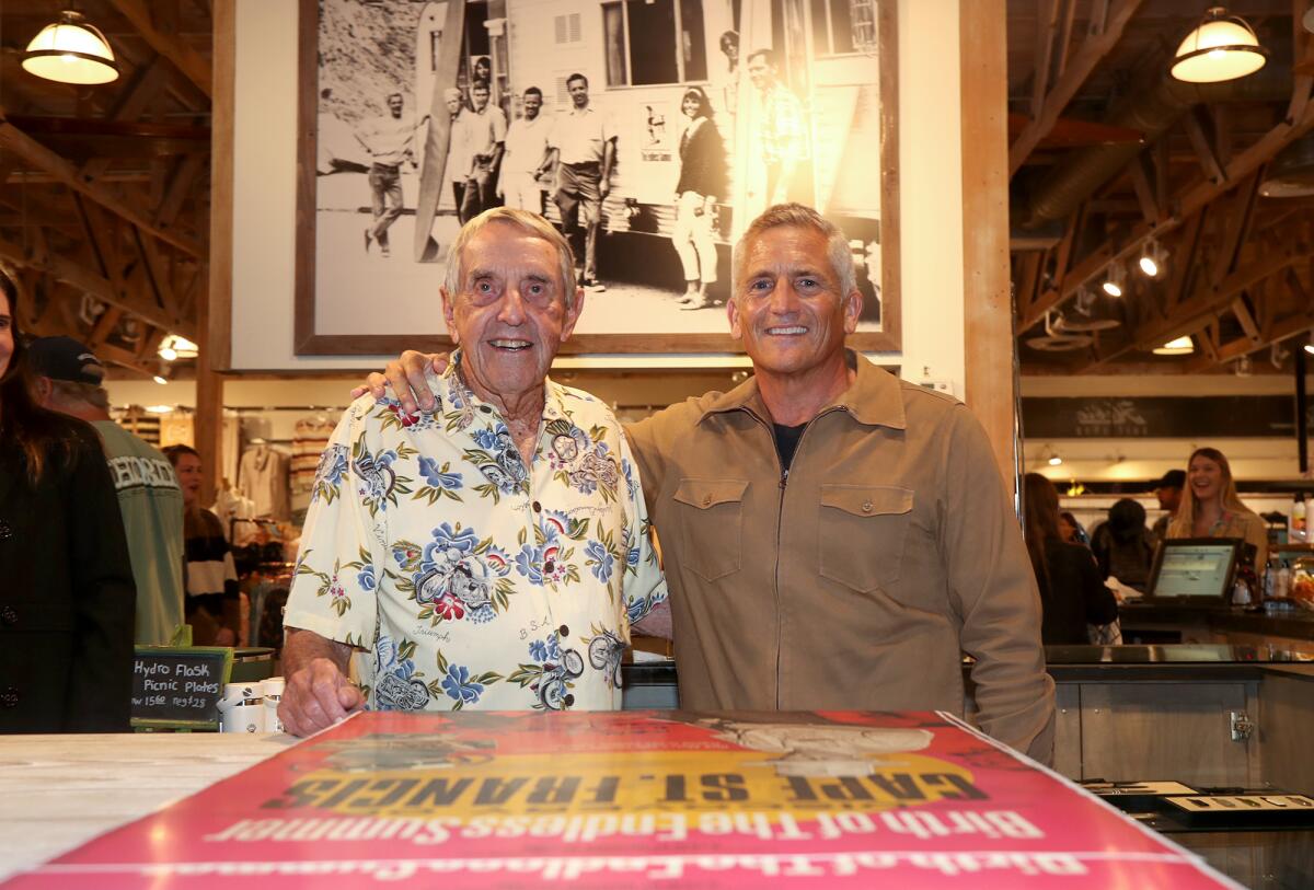Dick Metz, left, and director Richard Yelland pose for a picture.