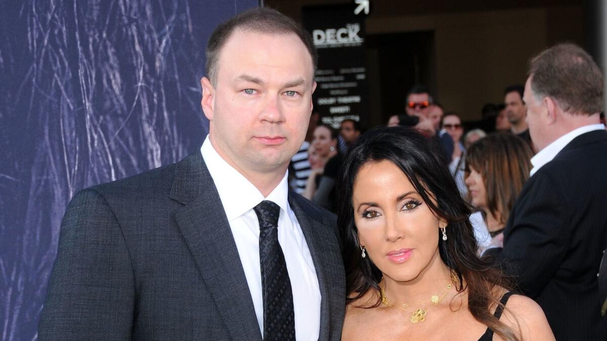 Producer Thomas Tull and wife Alba Tull attend the premiere of Universal Pictures' 'Warcraft' at TCL Chinese Theatre IMAX on June 6, 2016 in Hollywood, California.