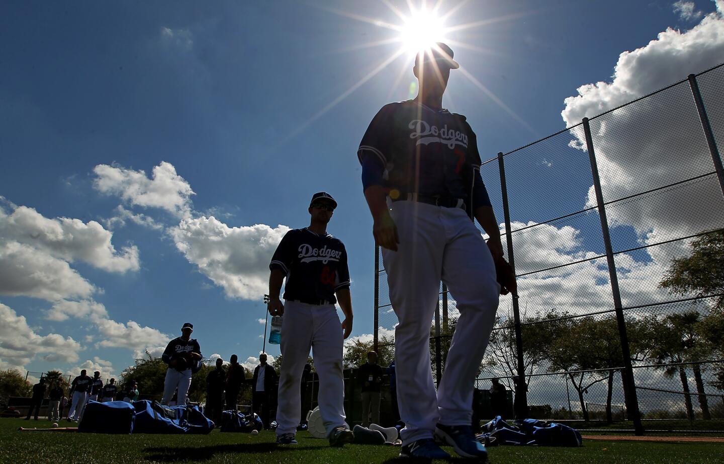 Dodgers players take the field for a workout on March 3 at Camelback Ranch in Glendale, Ariz.