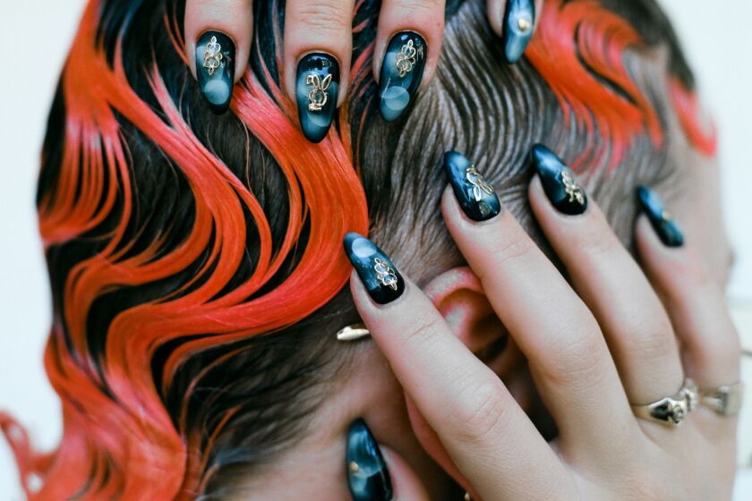 Model shows the nail work of Lila Robles, airbrush nail artist for the Image magazine, issue 5 - Beauty. LOS ANGELES TIMES - LILA ROBLES SHOT BY ANGELLA CHOE