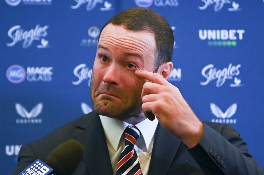Boyd Cordner reacts as he speaks to the media during a press conference in Sydney, Monday, June 14, 2021. Former Australia captain, Cordner has retired from rugby league because of the concussion symptoms that have kept him on the sidelines since last November. (Steven Saphore/AAP Image via AP)