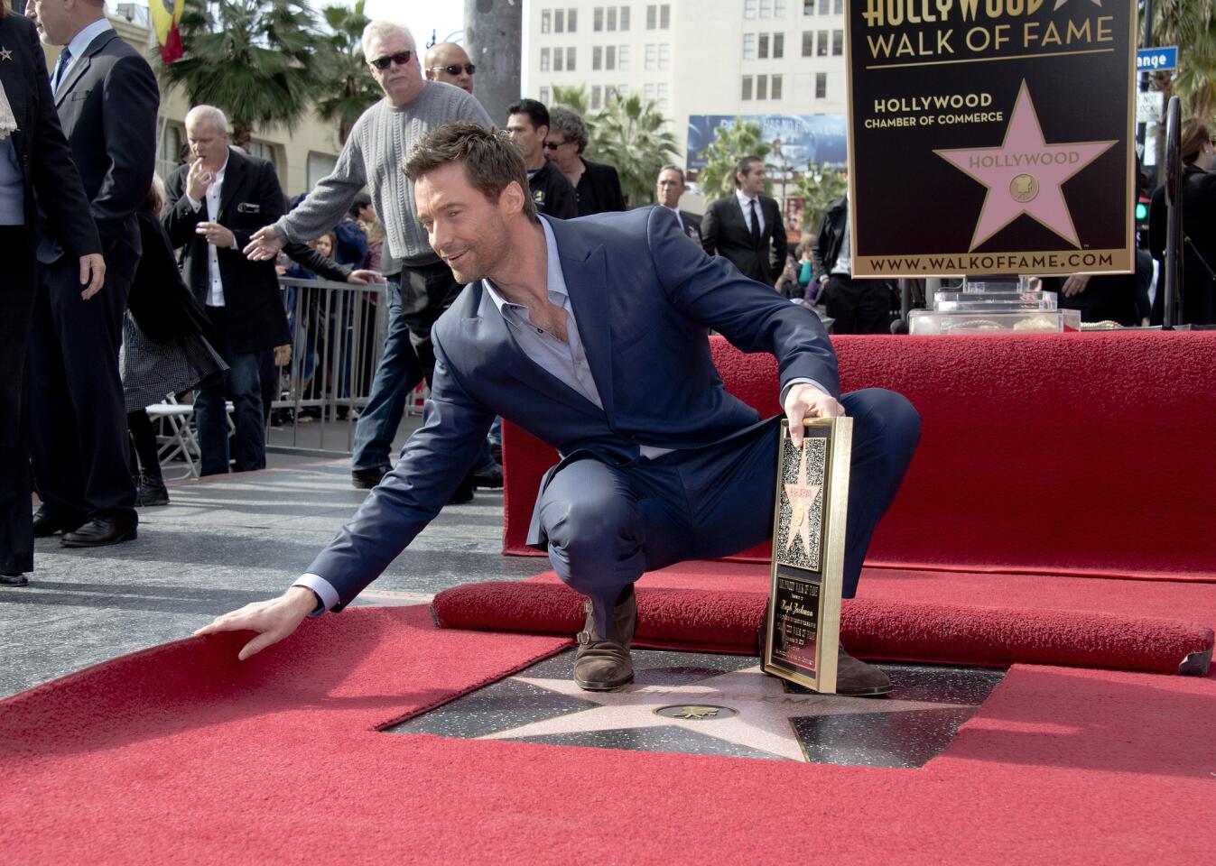 Hugh Jackman got his star on Hollywood's Walk of Fame on Thursday, introduced by Jay Leno and supported by his "Les Miserables" costars Anne Hathaway and Amanda Seyfried. "I believe this is the 2,487th star on the Walk of Fame," Jackman told the crowd, "however, apart from Lassie, I'm the only one who's gotten it for playing the same character in 15 movies." Full story: Hugh Jackman gets his star on Hollywood Walk of Fame | INTERACTIVE: Hollywood Star Walk