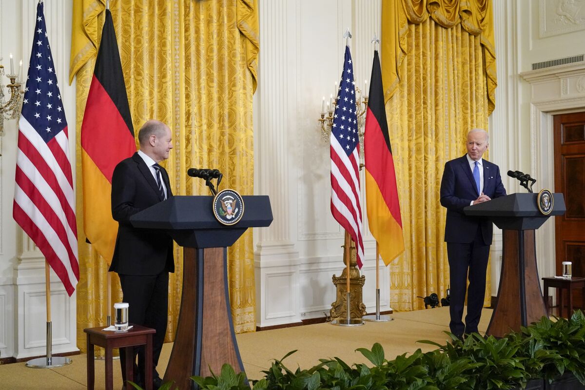 President Joe Biden speaks during a joint news conference with German Chancellor Olaf Scholz in the East Room of the White House, Monday, Feb. 7, 2022, in Washington. (AP Photo/Alex Brandon)
