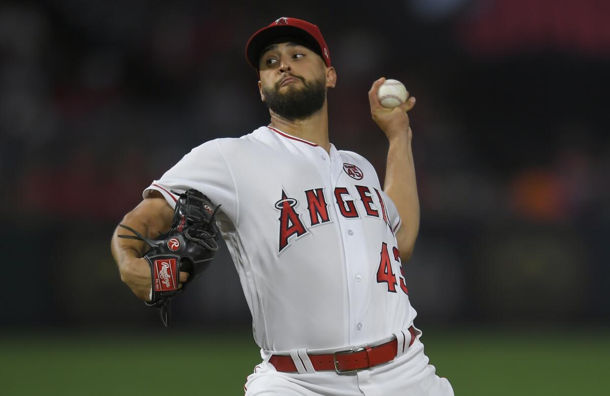 Angels pitcher Patrick Sandoval pitches against the Houston Astros in the first inning at Angel Stadium on Friday.
