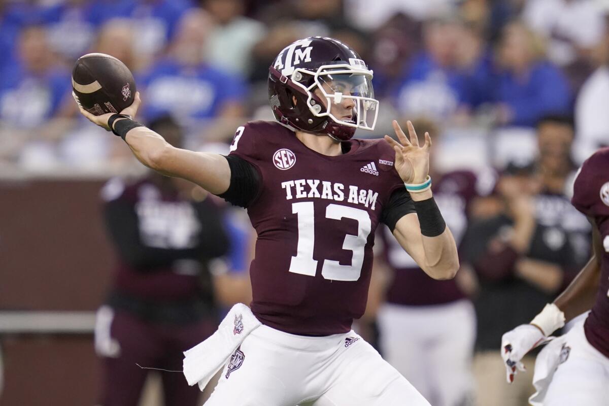 Texas A&M quarterback Haynes King (13) passes downfield against Kent State during the first half of an NCAA college football game on Saturday, Sept. 4, 2021, in College Station, Texas. (AP Photo/Sam Craft)
