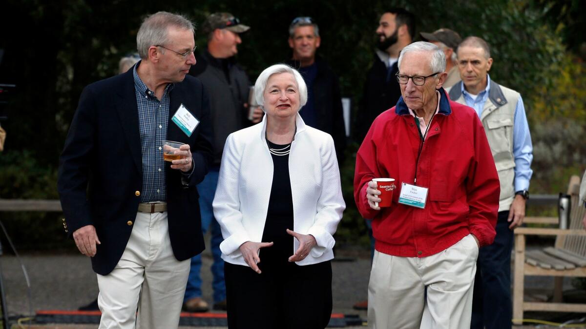 Federal Reserve Vice Chairman Stanley Fischer, right, with Fed Chairwoman Janet L. Yellen and William Dudley, president of the Federal Reserve Bank of New York, at a central bank conference in Jackson Hole, Wyo., in 2016.