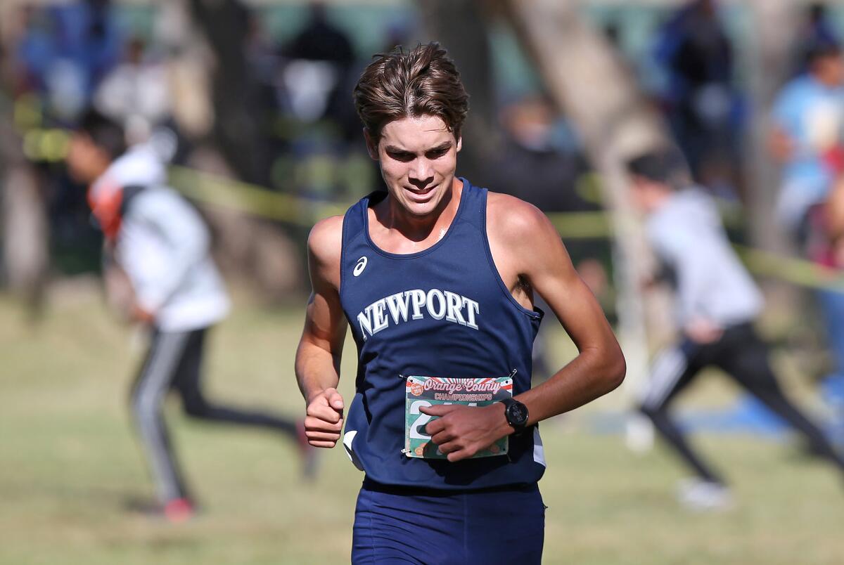 Newport Harbor's Will DeBassio runs in the Division 2 boys' varsity race during the Orange County Cross-Country Championships at Oak Canyon Park on Saturday.