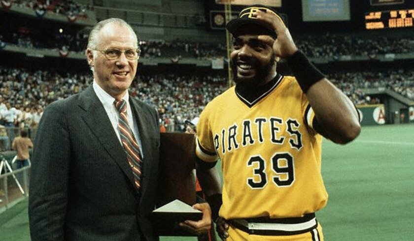 Commissioner Bowie Kuhn presents Pittsburgh's Dave Parker with the MVP award for the 1979 All-Star Game at Seattle's Kingdome.