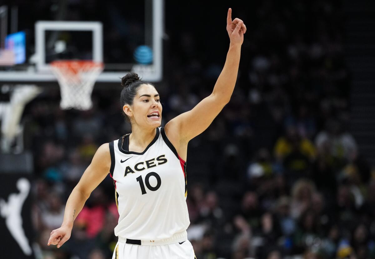 Las Vegas Aces guard Kelsey Plum (10) reacts after making a basket against the Seattle Storm during the second half of a WNBA basketball game Saturday, May 20, 2023, in Seattle. The Aces won 105-64. (AP Photo/Lindsey Wasson)