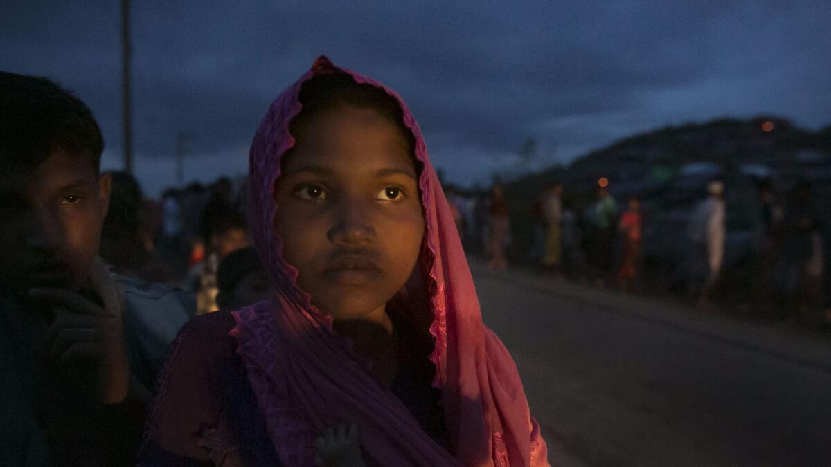 Refugees in a refugee camp in Bangladesh on Tuesday. Over 400,000 Rohingya refugees from Myanmar have fled into Bangladesh since late August.