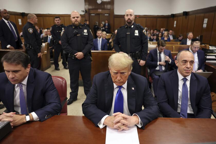 Former President Donald Trump appears at Manhattan criminal court during jury deliberations.