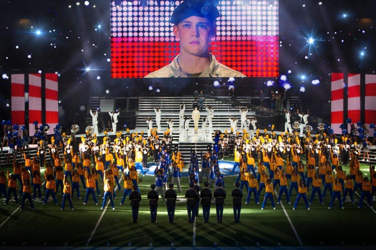 Joe Alwyn, portraying Billy Lynn, on a screen in a scene from the film "Billy Lynn's Long Halftime Walk," in theaters Nov. 11.