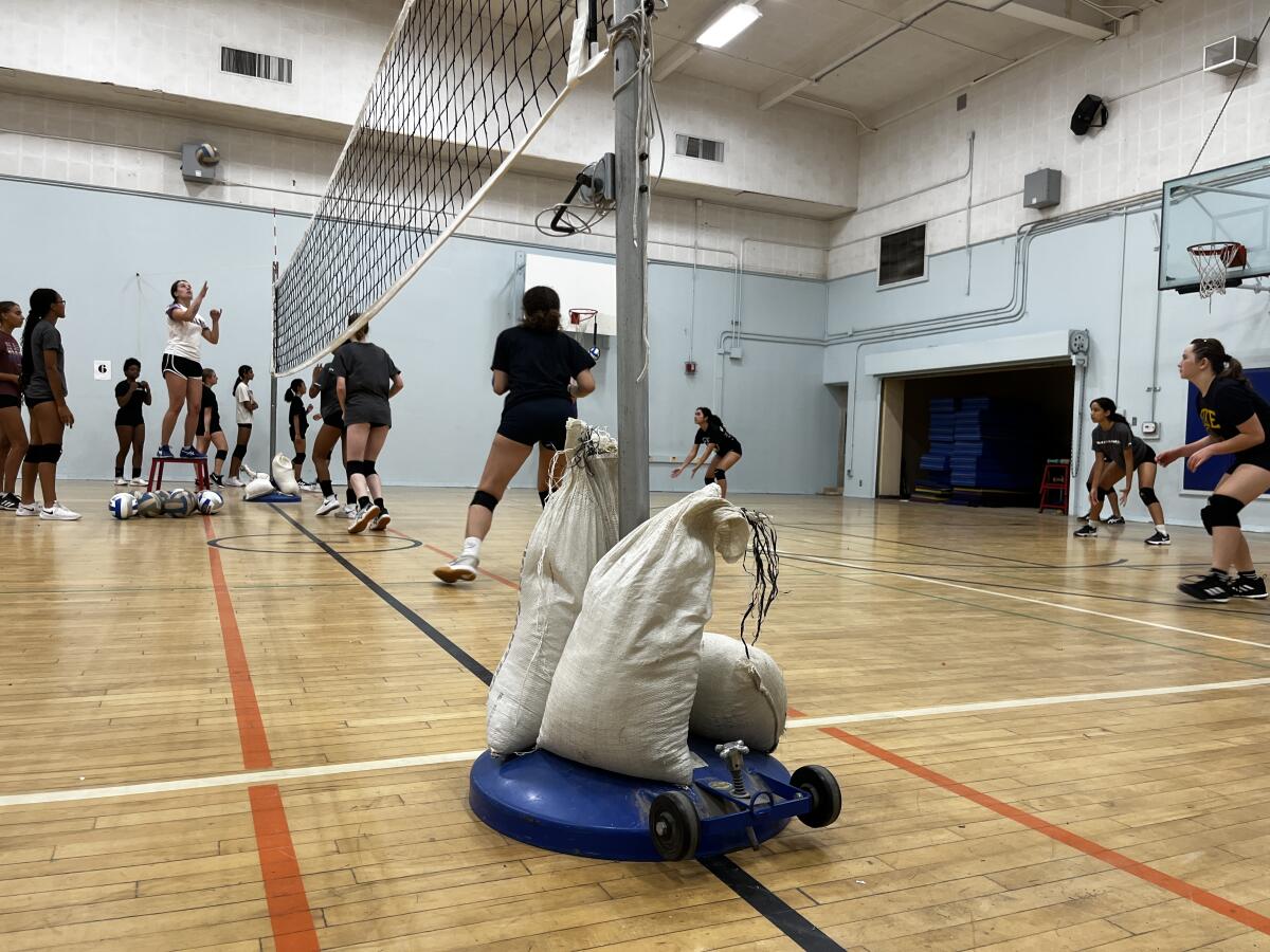 Sandbags stabilize the net at GALA's practices.