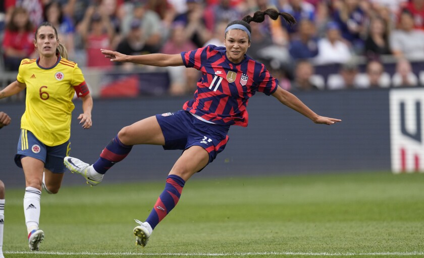 U.S. forward Sophia Smith reacts after kicking the ball in front of Colombia midfielder Daniela Montoya on June 25, 2022.