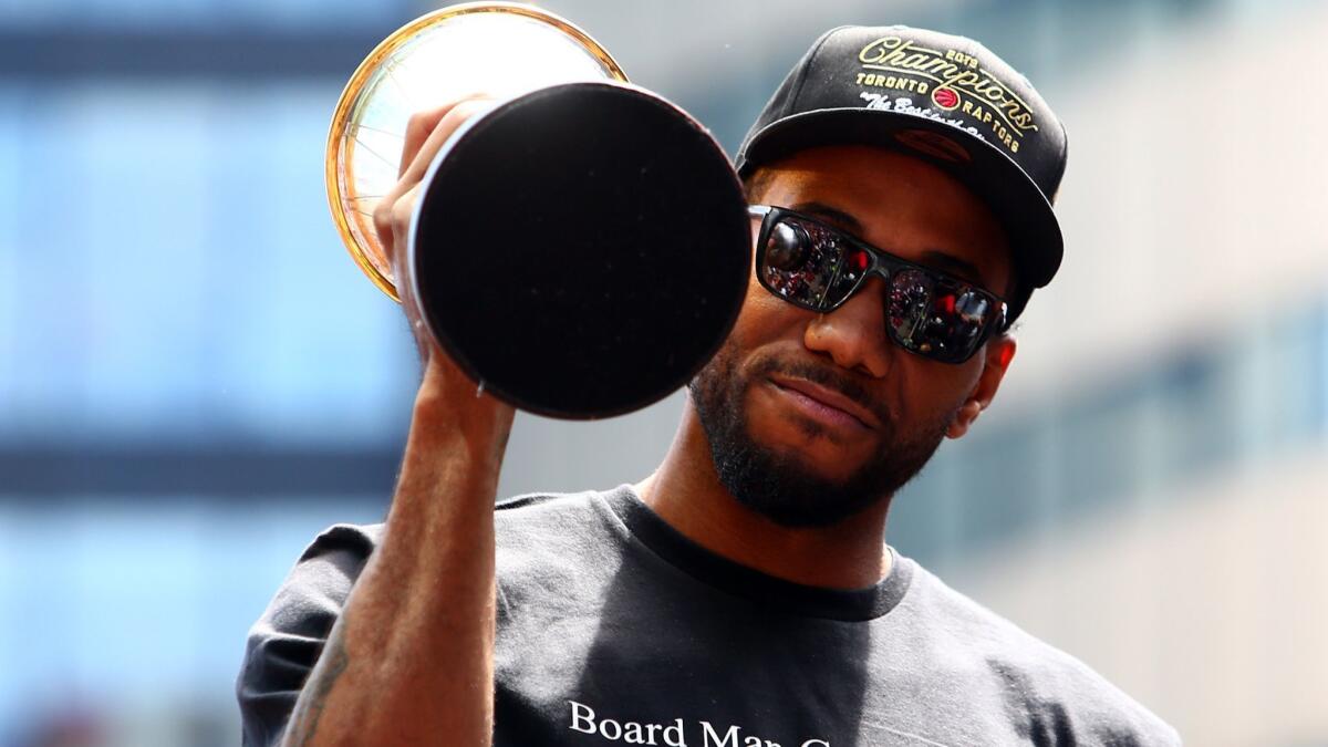 Kawhi Leonard, shown holding the NBA Finals MVP trophy during the Toronto Raptors' victory parade, will be the Clippers' top target during free agency.