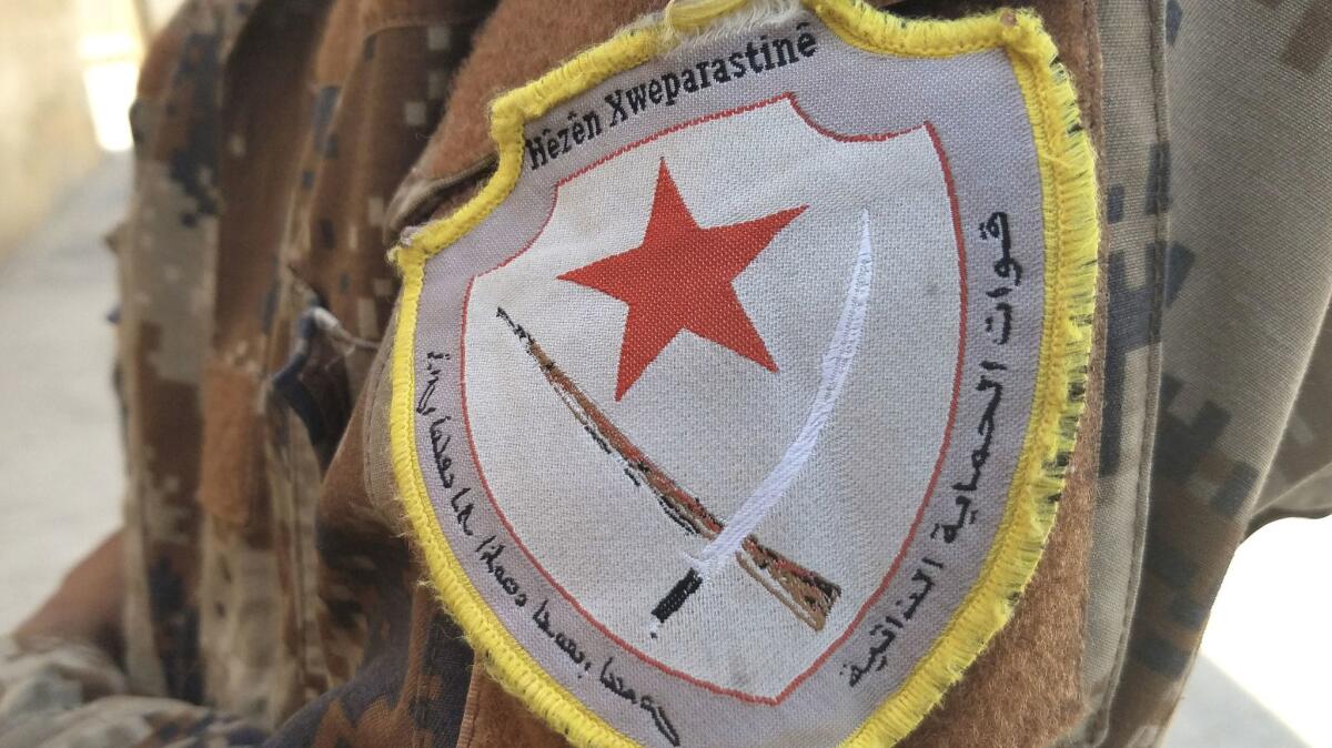 Syrian Self-Defense Forces: Drafted by Kurdish authorities to defend northern Syria, they are local, multi-ethnic troops. Those drafted train for about a month with the YPG. Some young men attempt to avoid the draft by fleeing to Iraq and Syria. But if caught by the Asayish, or Kurdish police, they can be forced to serve.