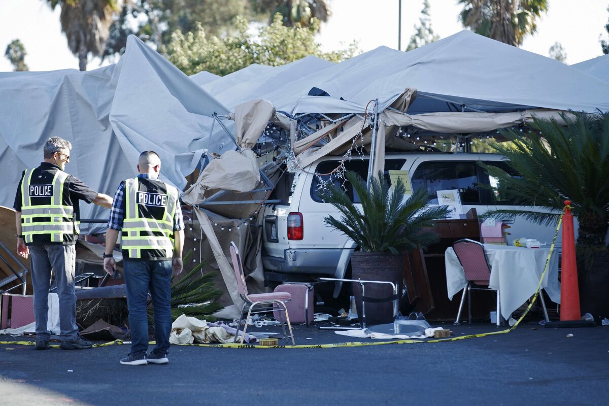 Police investigate the area where a driver slammed into an outdoor dining area at Grand Century Plaza in San Jose on Sunday.