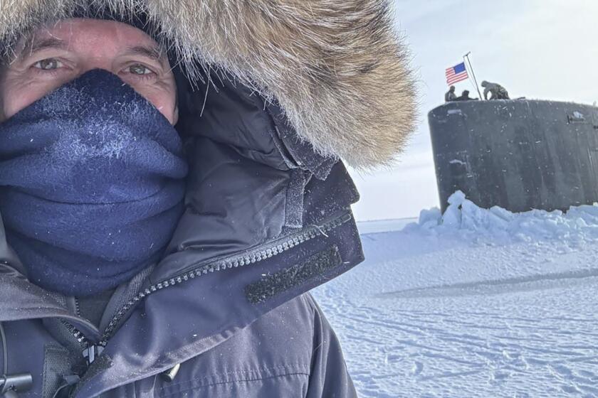 This image provided by FOX News Media shows an anchor Bill Hemmer shooting a scene from “Battle for the Arctic with Bill Hemmer.” (FOX News Media via AP)