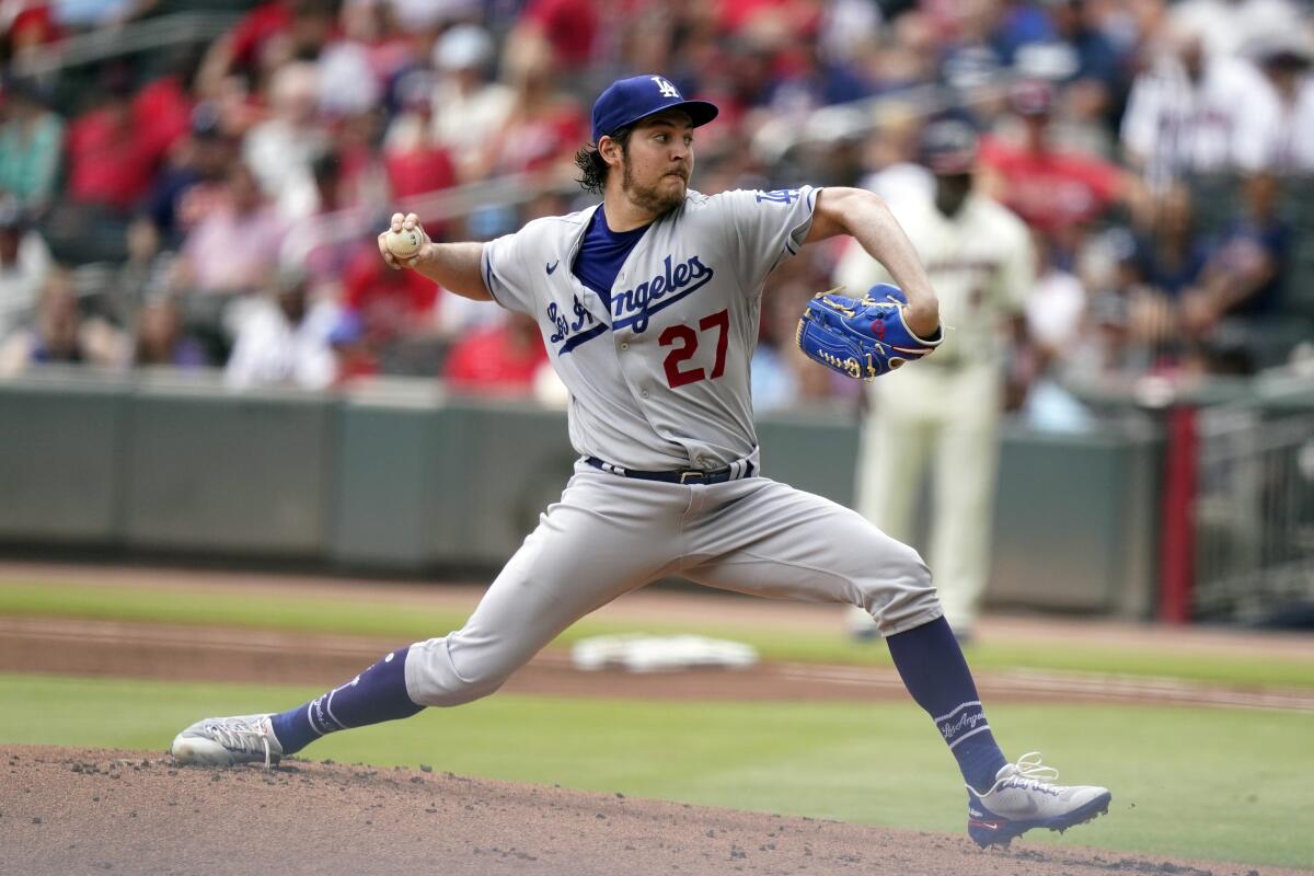 Dodgers starting pitcher Trevor Bauer delivers against the Atlanta Braves on Sunday.