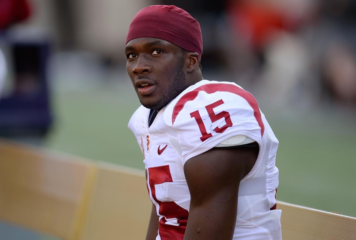 Trojans receiver Nelson Agholor takes a breather after tying a USC record with a second punt return touchdown in the first half against California.