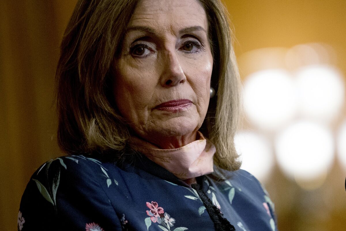 House Speaker Nancy Pelosi of Calif., pauses during a news conference on Capitol Hill in Washington, Wednesday, July 15, 2020, to mark two months since House passage of "The Heroes Act" or the Health and Economic Recovery Omnibus Emergency Solutions Act. (AP Photo/Andrew Harnik)