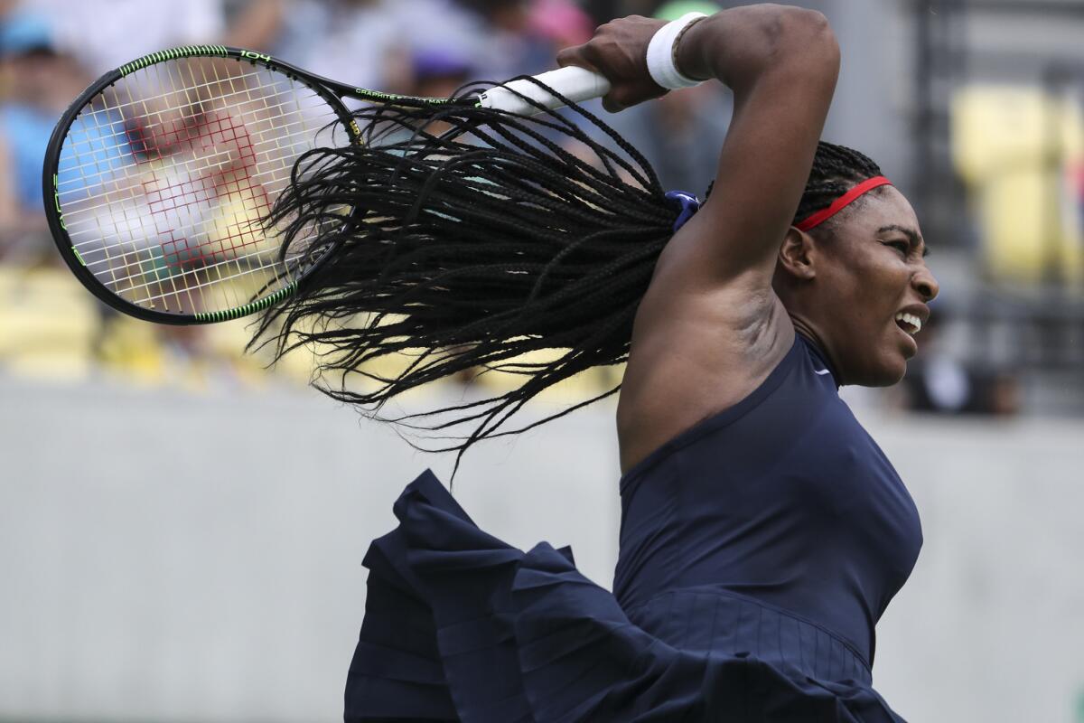 U.S. tennis player Serena Williams competes against Daria Gavrilova of Australia in the first round of the women's singles tournament at the Olympic Tennis Centre on Aug. 7.