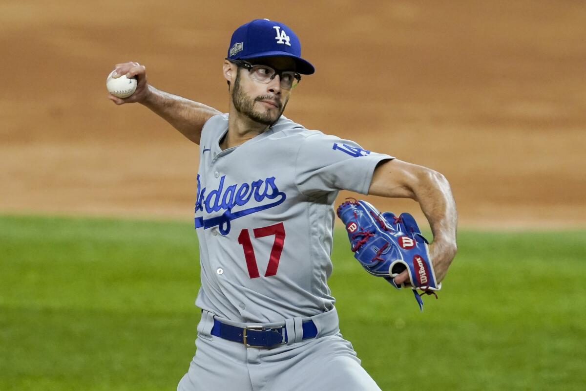 Los Angeles Dodgers relief pitcher Joe Kelly throws against the Atlanta Braves during the third inning.