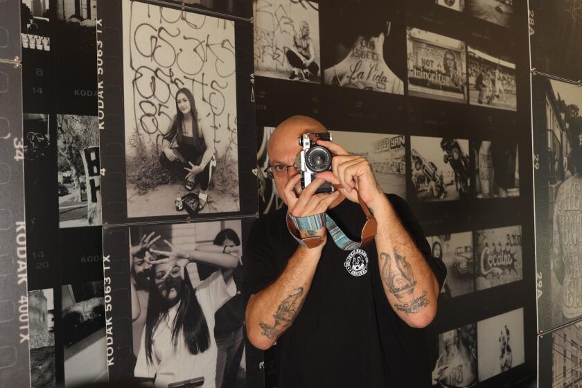 Los Angeles, CA - June 25: Estevan Oriol poses for a portrait at Beyond The Streets Gallery on Tuesday, June 25, 2024 in Los Angeles, CA. Oriol is having a gallery alongside Teen Angel Magazine of LA Chicano culture (Michael Blackshire / Los Angeles Times)