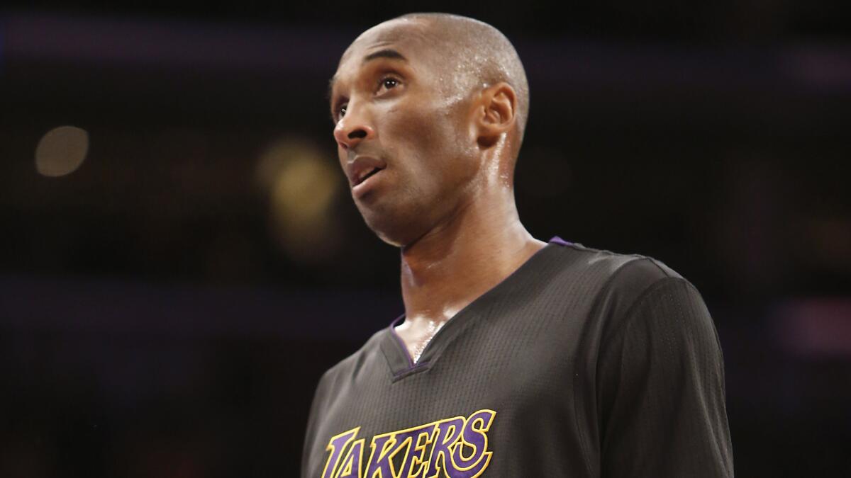 Lakers star Kobe Bryant looks on during a loss to the Clippers on Friday.