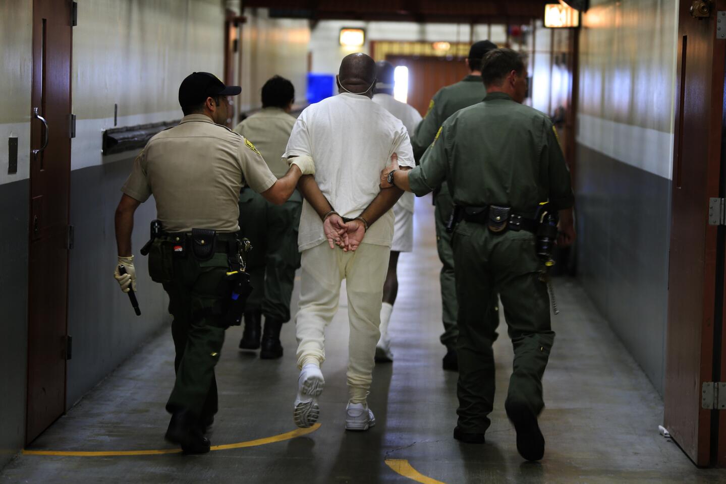 Inmates escorted