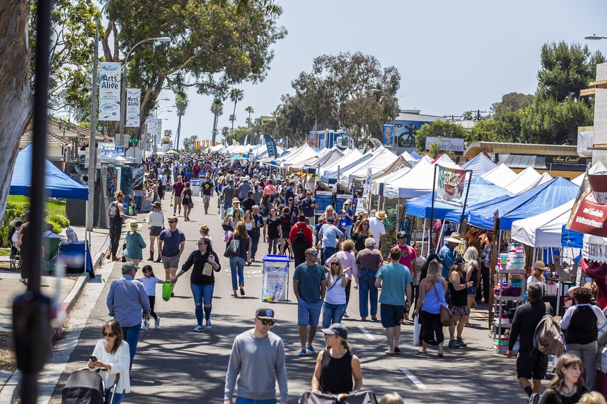 The Encinitas street fair hosts more than 450 vendors selling food, drinks and arts and crafts.