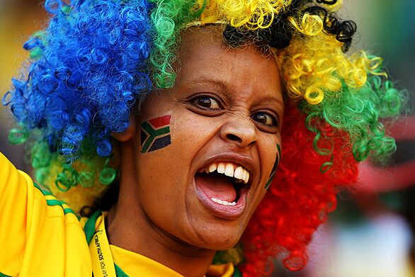 A South Africa fan shows her support during the Opening Ceremony.