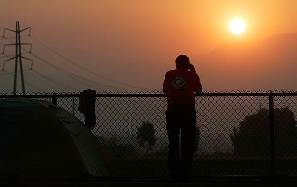 Sunrise at the Station fire command center at Hansen Dam Park. The western leg of the fire pushed toward Pacoima Canyon, prompting the evacuation of 11 homes.