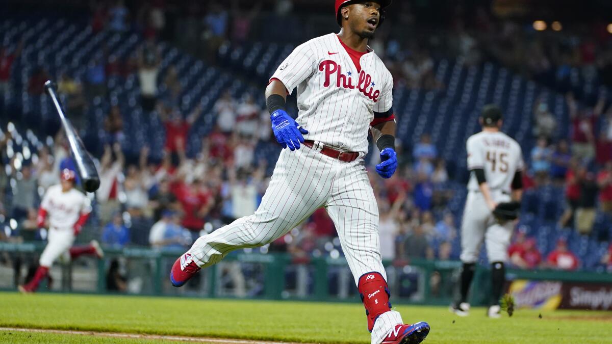 Phillies shortstop Jean Segura exits after taking fastball off