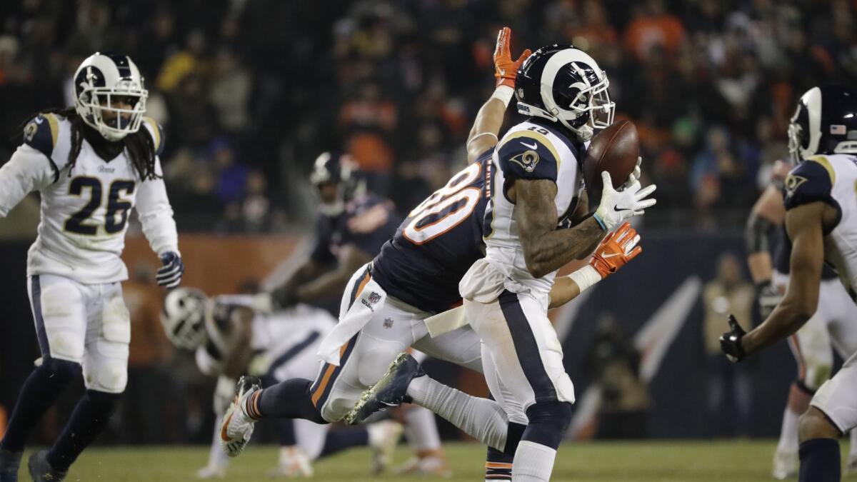 Rams strong safety John Johnson (43) intercepts a pass intended for Chicago Bears tight end Trey Burton (80) during the second half.