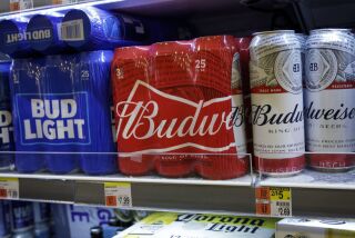 NEW YORK, NY - JULY 26: Cans of Budweiser and Bud Light sit on a shelf for sale at a convenience store, July 26, 2018 in New York City. Anheuser-Busch InBev, the brewer behind Budweiser and Bud Light, said on Thursday that U.S. revenues fell 3.1% in the second quarter. American consumers continue to shift away from domestic lagers and toward crafts beers and wine and spirits. (Photo by Drew Angerer/Getty Images) ** OUTS - ELSENT, FPG, CM - OUTS * NM, PH, VA if sourced by CT, LA or MoD **