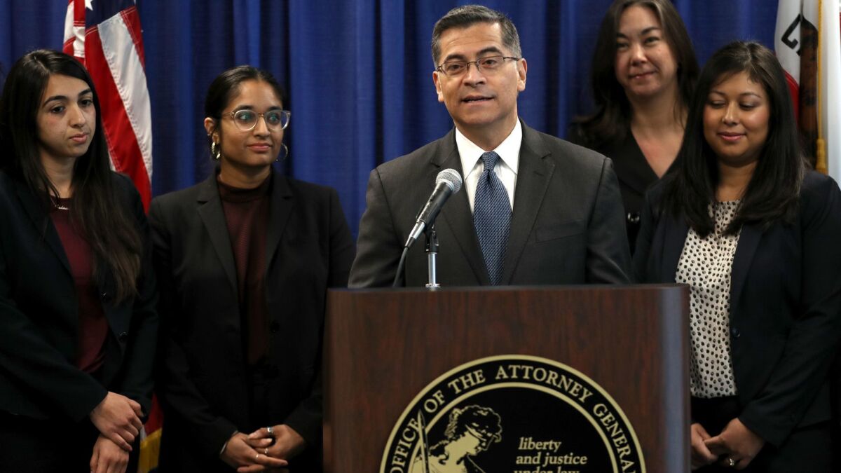 California Atty. Gen. Xavier Becerra speaks during a news conference in February.
