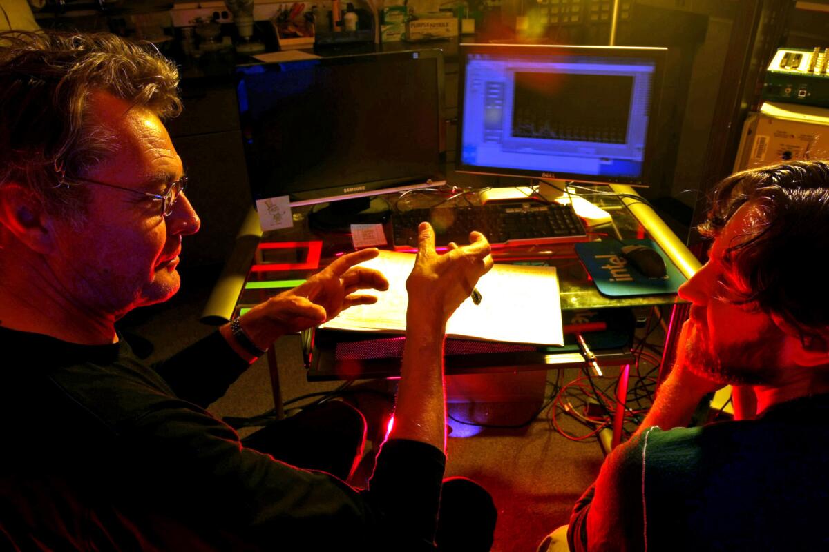 Jim Gimzewski and Henry Sillin at work in their lab. The project is funded by the Pentagon's Defense Advanced Research Projects Agency and Japan's National Institute for Material Science. Bart Kosko, professor of electrical engineering at USC, said the Pentagon's backing is evidence that the research is "credible and certainly not kooky."