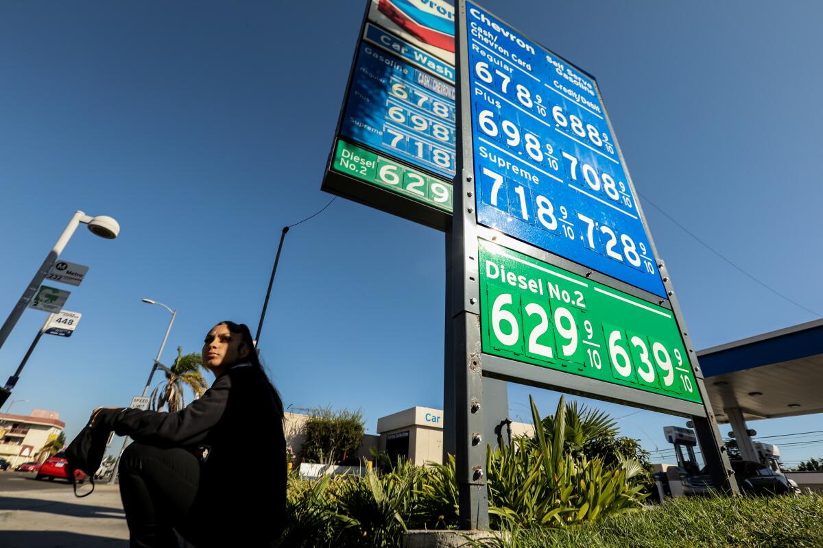 The price of regular gasoline hovers near $7 per gallon at a Chevron station in Torrance on Oct. 3. 