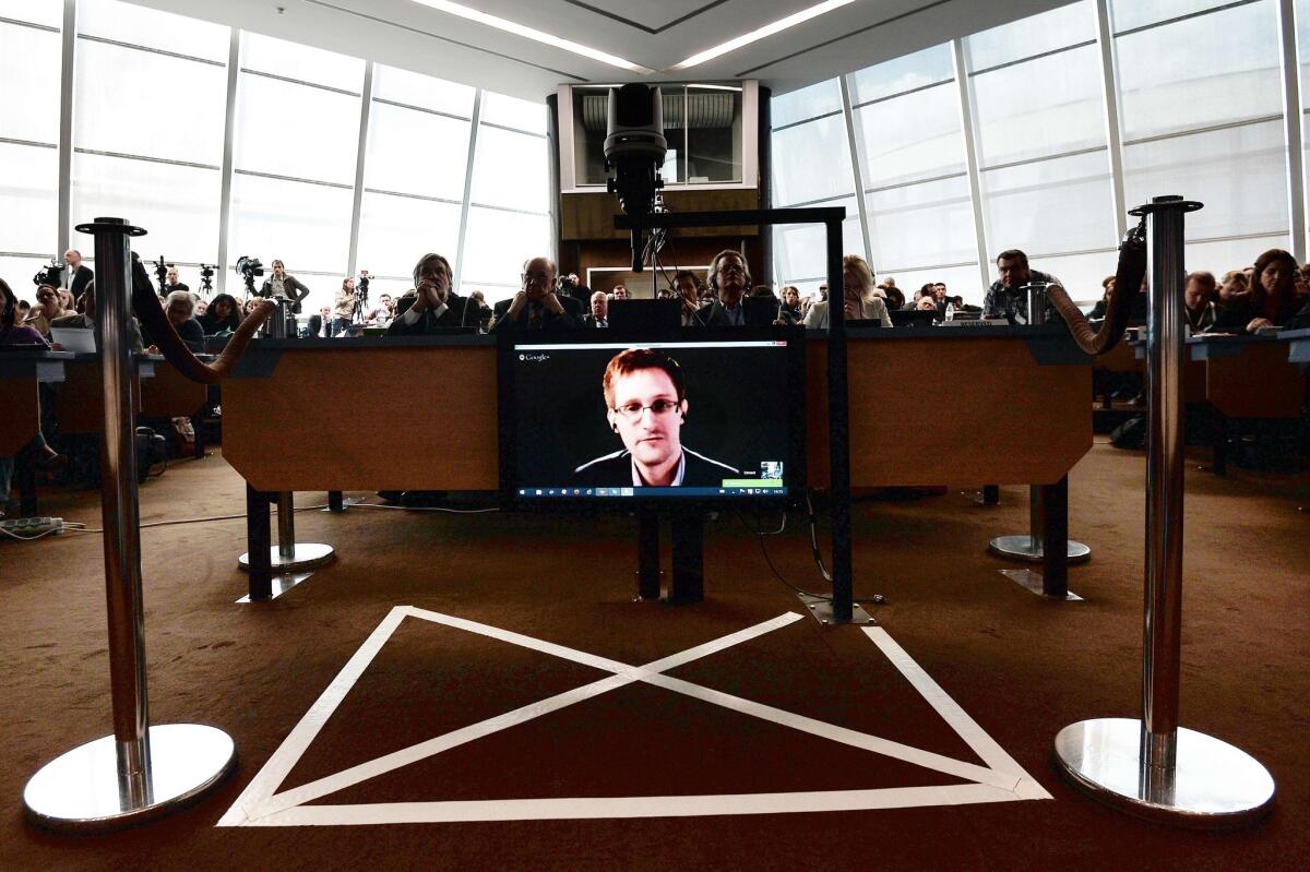 NSA whistle blower Edward Snowden speaks to European officials via videoconference.