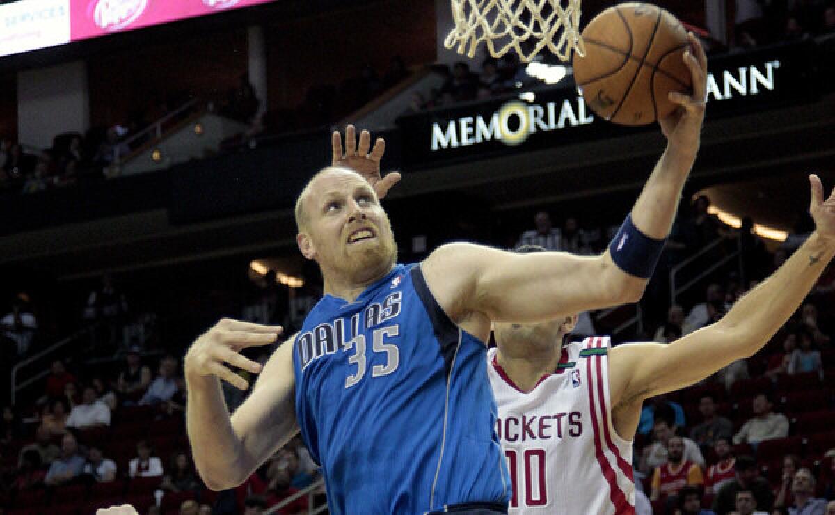 Newly signed Lakers center Chris Kaman says he's happy to be back in Los Angeles.