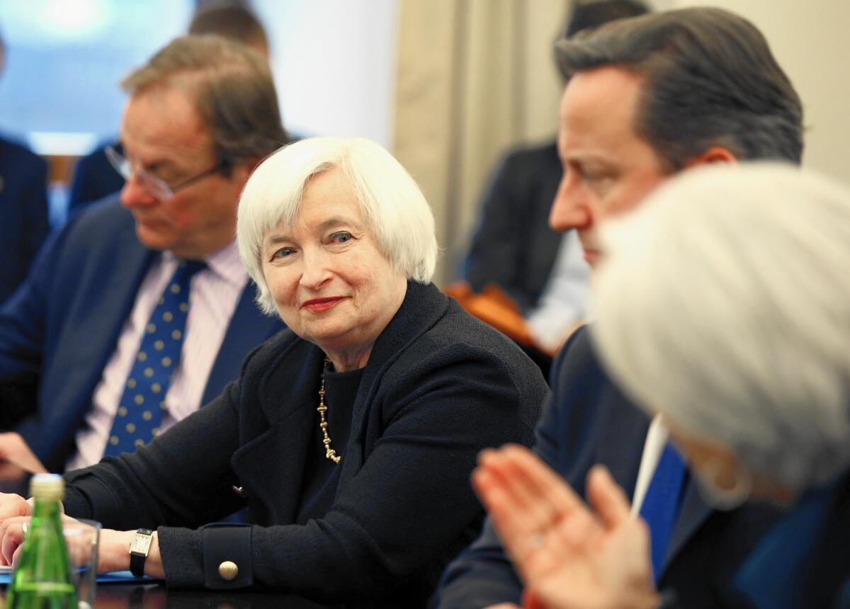 Federal Reserve Chairwoman Janet L. Yellen, left, is acknowledged by International Monetary Fund Managing Director Christine Lagarde, right, with British Prime Minister David Cameron, during a meeting at the IMF this month.