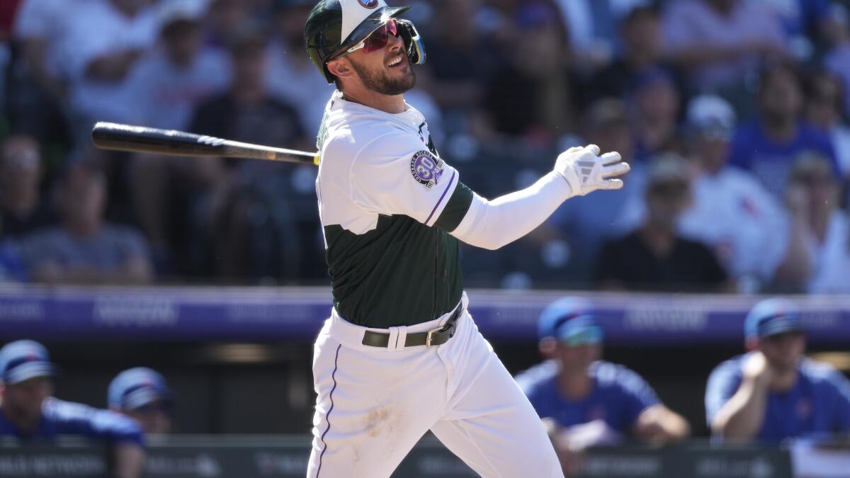 Four homers rally Rockies past Cubs, 7-3