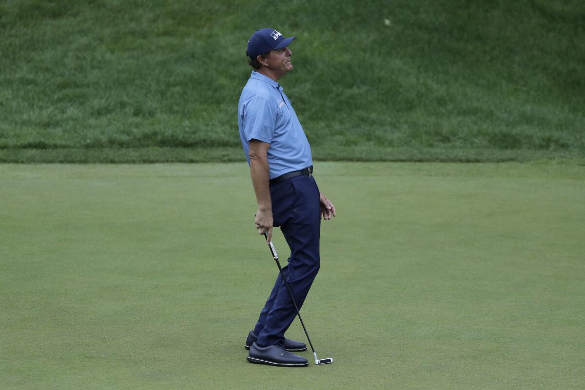 Phil Mickelson reacts after missing a putt in the third round of the Travelers Championship on June 27, 2020.