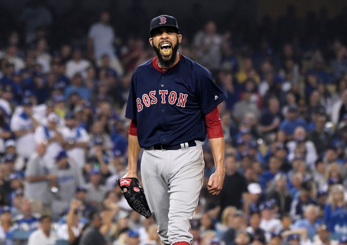Red Sox pitcher David Price reacts after getting Dodgers Yasiel Puig to ground out in the 7th inning.