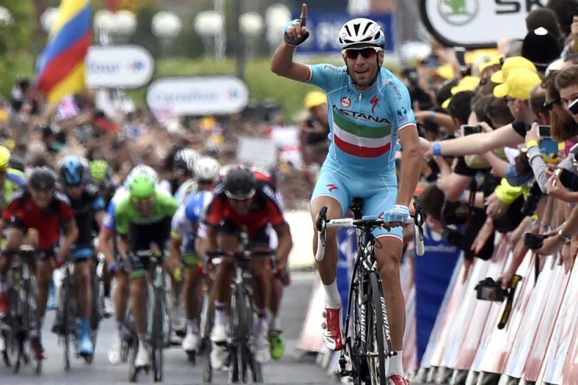 Vincenzo Nibali of Italy celebrates as he crosses the finish line at the end of the second stage of the Tour de France on Sunday in Sheffield, England.