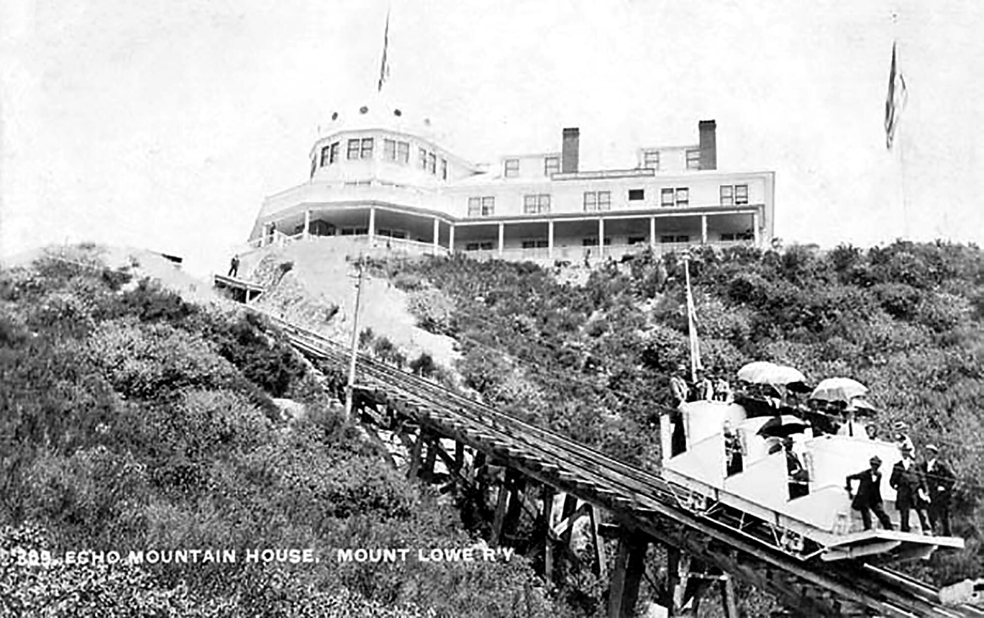 In a vintage photo, an incline car approaches Echo Mountain House.