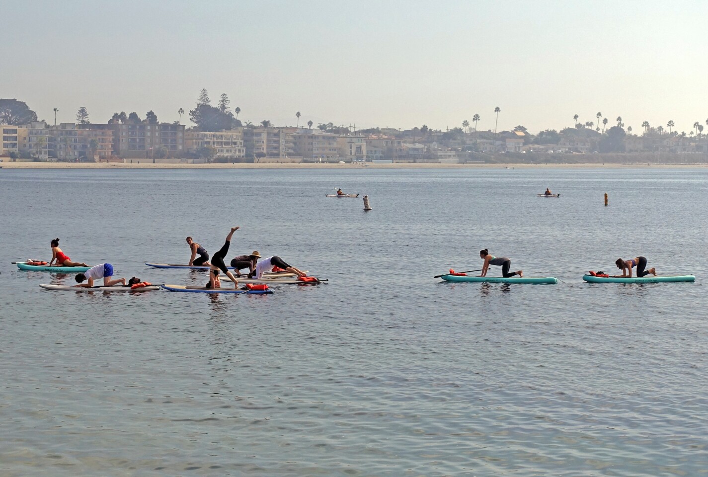 Mission Bay in San Diego is placid enough for paddleboard yoga.